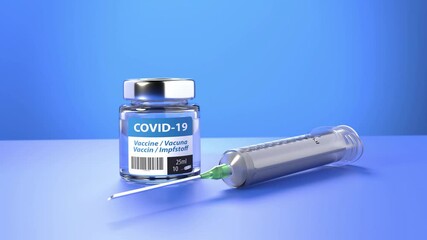 Wall Mural - Vaccination against Corona Virus Covid-19: glass container with 10 doses of vaccination and syringe in front of it. The word vaccination in English, Spanish, French and German on the label.