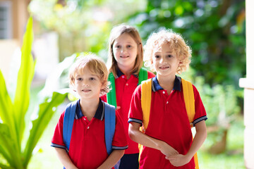 Poster - Child going back to school. Start of new school year after summer vacation. Little girl with backpack and books on first school day. Beginning of class. Education for kindergarten and preschool kids.