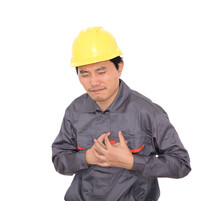 Migrant Worker With Heart Attack In Front Of White Background