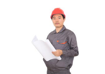 A construction worker wearing a red hard hat is holding drawing in front of a white background