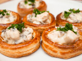 Fototapeta  - Vol-au-vent - puff pastry filled with chicken and mushrooms ragout