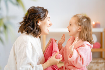 Wall Mural - mother and daughter in the bathroom.