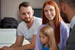 © alfa27 - redhead woman with husband and daughter emotionally talk about their problems to psychologist, therapist. they sit in the office discussing