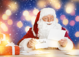 Poster - Santa Claus reading letters at table