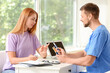 © Pixel-Shot - Diabetic woman visiting doctor in clinic