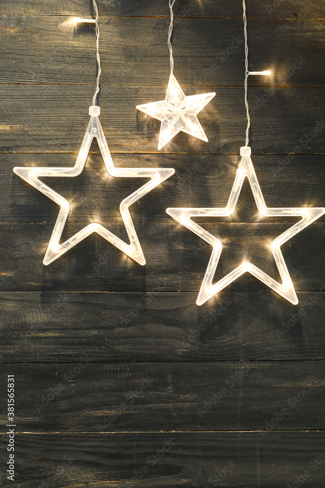 Beautiful Christmas garland on wooden background