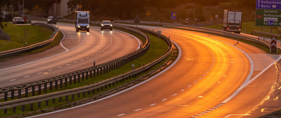 Wall Mural - highway in the light of the setting sun