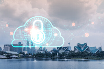 Padlock icon hologram over panorama city view of Kuala Lumpur to protect business, Malaysia, Asia. The concept of information security shields. Double exposure.