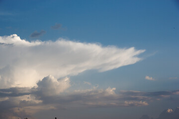 Wall Mural - white yacht on sea surface and storm clouds