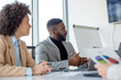 © Sanja - A group of business partners is sitting in a conference room, business partners have new business idea