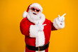 © deagreez - Portrait of his he nice attractive cheerful cheery fat Santa pointing presenting copy space newyear party idea shopping isolated over bright vivid shine vibrant yellow color background