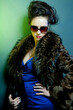 © Raisa Kanareva - woman with fashion sunglasses and handbag