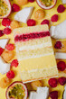 Slice of cake in the section on the background of fruit