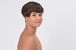 © curto - portrait of a shirtless teen boy on white background, looking at camera