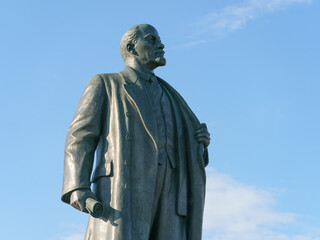 Famous Vladimir Lenin statue at the Exhibition of Achievements of National Economy (VDNKh) in Moscow. Blue summer sky as background. Historical heritage concept.