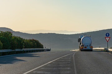 Wall Mural - Tank truck with dangerous goods joining the highway