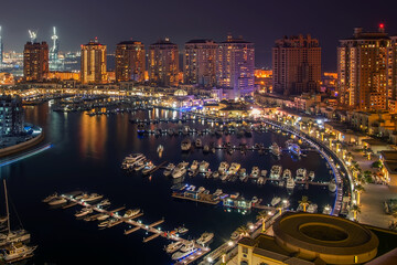 Wall Mural - Beautiful sunset Aerial View of Pearl Qatar artificial island.