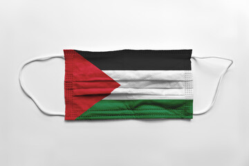 Canvas Print - Face mask with Palestine flag printed, on white background, isolated