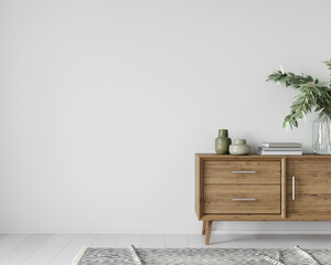 Interior with a wooden chest of drawers and green decor