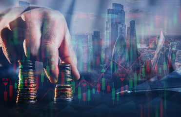 Businessman holding coin with  graph. Double exposure of financial graph and city.Technical price candlestick chart graph and indicator stock online trading. Forex investment business.