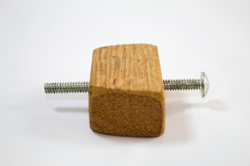 Wood with a screw and white background