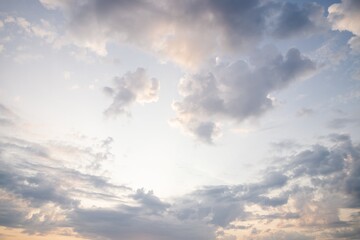 Wall Mural - Beautiful evening sky. Scenic sky background. Warm sky with delicate clouds