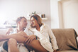© Erika - Smiling lovely young couple relaxing. Couple in love. Happy day. Good morning.