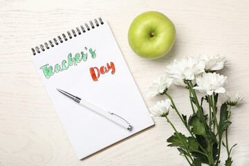 Canvas Print - Flat lay composition with words TEACHER'S DAY, flowers and apple on white wooden table