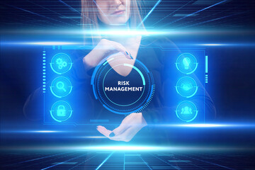 Wall Mural - Business, Technology, Internet and network concept. Young businessman working on a virtual screen of the future and sees the inscription: Risk management