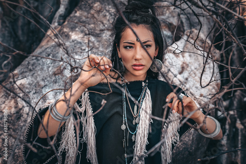 Plakat beautiful young stylish tribal woman outdoors portrait