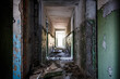 © olyasolod - Long corridor of ruined abandoned house