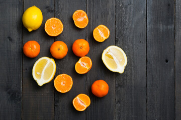 Wall Mural - Fruits on black wood table