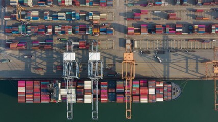 Canvas Print - Time lapse Container , container ship in export and import business and logistics. Shipping cargo to harbor by crane. Water transport International. Aerial view and top view.