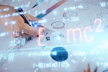 Student or teacher with mathematical and scientific formulas. Concepts of education.
