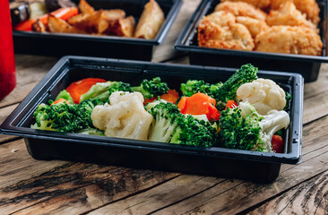 Restaurant healthy food delivery in take away boxes