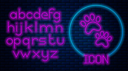 Poster - Glowing neon Paw print icon isolated on brick wall background. Dog or cat paw print. Animal track. Neon light alphabet. Vector.