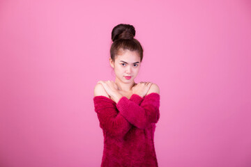 Portrait of beautiful asia young woman, on pink color background with copy space. Human face expressions, emotions feelings, body language,beauty and fashion concept.