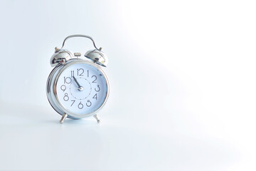 old alarm clock on white background.copy spase