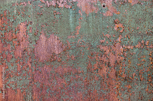 Cuadros en Lienzo Green and orange rusting decaying metal texture with peeling paint