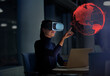 © Robert Daly/Caia Image - Businesswoman with virtual reality glasses touching virtual globe