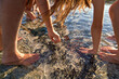 © Trevor Adeline/Caia Image - Father and daughter playing in ocean tide pool