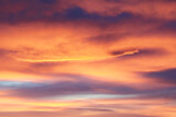 Fototapeta Zachód słońca - Clouds during sunset, orange