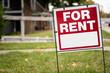 © David Gales - For rent sign in the yard in front of a house
