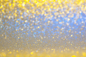  Gold, yellow,blue abstract light background, Golden shining lights, sparkling glittering Christmas lights. Blurred abstract holiday background..