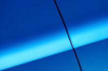 Fragment Of Blue Steel Car Bodywork, Vehicle Silver Paint Coating Texture, Selective Focus, Abstract Background
