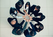 © yurolaitsalbert - top view. group of young professionals standing in a circle