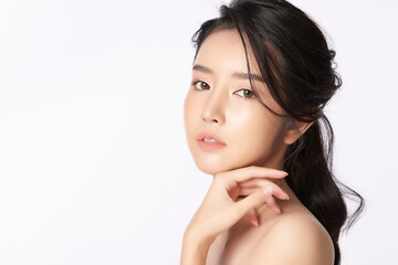 beautiful young asian woman with clean fresh skin on white background, face care, facial treatment, 