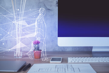 Desktop computer background in office and start up theme hologram drawing. Double exposure. Startup concept.