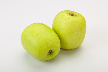 Two ripe green sweet apples