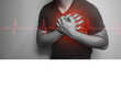 A close-up of a black and white hand in the chest with chest pain from a heart attack. Health care concept